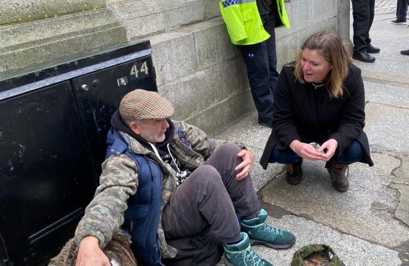Cherilyn Mackrory MP speaking with local homeless man in Truro